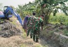 Normalisasi Irigasi Dusun Lingsir Dikebut, TMMD ke-128 Kodim 0817/Gresik Hadirkan Harapan Baru bagi Petani 