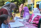 Hangatnya Pelayanan Posyandu TMMD Ke-128 Kodim 0817/Gresik di Slempit