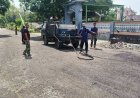 Antusias Sambut Jalan Baru, Satgas TMMD dan Warga Slempit Siapkan Pengaspalan Jalan Desa